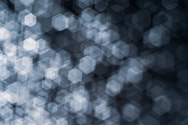 Bokeh 'in soyut arkaplan resmi altıgen şekil bulanıklaştırıcı lens tarafından oluşturuldu.