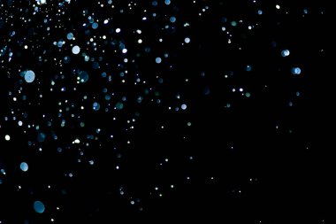 Soyut renkli çözünmüş dairesel fakül, soyut arkaplan. Soyut arkaplan. Gri, beyaz daireler, siyah arka planda ışıklar. Bulanık, bulanık resim.