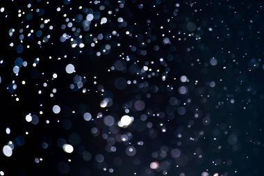 Soyut renkli çözünmüş dairesel fakül, soyut arkaplan. Soyut arkaplan. Gri, beyaz daireler, siyah arka planda ışıklar. Bulanık, bulanık resim.