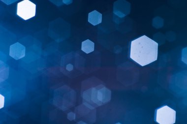 Bulanık lensten mavi bokeh 'in soyut arkaplan resmi. arkaplan kullanımı