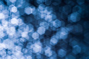 Bulanık lensten mavi bokeh 'in soyut arkaplan resmi. arkaplan kullanımı