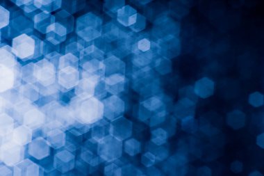 Bulanık lensten mavi bokeh 'in soyut arkaplan resmi. arkaplan kullanımı