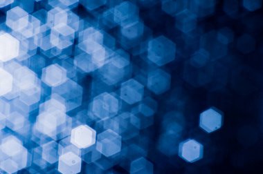 Bulanık lensten mavi bokeh 'in soyut arkaplan resmi. arkaplan kullanımı