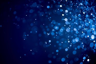 Bulanık lensten mavi bokeh 'in soyut arkaplan resmi. arkaplan kullanımı