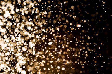 Güzel Noel ışıklarının bulanık görüntüsü, bokeh etkisi. Güzel Altın Renk Bokeh Etkisi. Işıltılı ışıklar arka plan grunge, parıltı soyut Parıltılı Işıklar ve Yıldızlar Noel Arkaplanı.