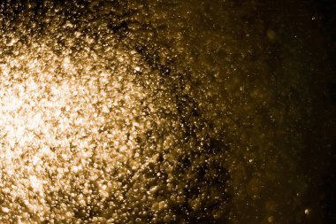 Güzel Noel ışıklarının bulanık görüntüsü, bokeh etkisi. Güzel Altın Renk Bokeh Etkisi. Işıltılı ışıklar arka plan grunge, parıltı soyut Parıltılı Işıklar ve Yıldızlar Noel Arkaplanı.