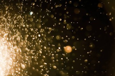 Güzel Noel ışıklarının bulanık görüntüsü, bokeh etkisi. Güzel Altın Renk Bokeh Etkisi. Işıltılı ışıklar arka plan grunge, parıltı soyut Parıltılı Işıklar ve Yıldızlar Noel Arkaplanı.