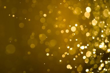 Güzel Noel ışıklarının bulanık görüntüsü, bokeh etkisi. Güzel Altın Renk Bokeh Etkisi. Işıltılı ışıklar arka plan grunge, parıltı soyut Parıltılı Işıklar ve Yıldızlar Noel Arkaplanı.