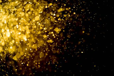 Güzel Noel ışıklarının bulanık görüntüsü, bokeh etkisi. Güzel Altın Renk Bokeh Etkisi. Işıltılı ışıklar arka plan grunge, parıltı soyut Parıltılı Işıklar ve Yıldızlar Noel Arkaplanı.