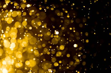 Güzel Noel ışıklarının bulanık görüntüsü, bokeh etkisi. Güzel Altın Renk Bokeh Etkisi. Işıltılı ışıklar arka plan grunge, parıltı soyut Parıltılı Işıklar ve Yıldızlar Noel Arkaplanı.