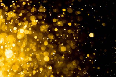 Güzel Noel ışıklarının bulanık görüntüsü, bokeh etkisi. Güzel Altın Renk Bokeh Etkisi. Işıltılı ışıklar arka plan grunge, parıltı soyut Parıltılı Işıklar ve Yıldızlar Noel Arkaplanı.
