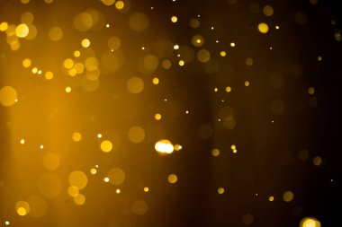 Güzel Noel ışıklarının bulanık görüntüsü, bokeh etkisi. Güzel Altın Renk Bokeh Etkisi. Işıltılı ışıklar arka plan grunge, parıltı soyut Parıltılı Işıklar ve Yıldızlar Noel Arkaplanı.