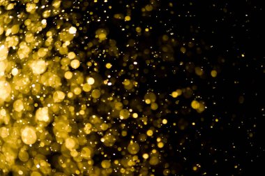 Güzel Noel ışıklarının bulanık görüntüsü, bokeh etkisi. Güzel Altın Renk Bokeh Etkisi. Işıltılı ışıklar arka plan grunge, parıltı soyut Parıltılı Işıklar ve Yıldızlar Noel Arkaplanı.