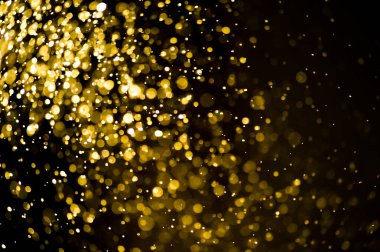 Güzel Noel ışıklarının bulanık görüntüsü, bokeh etkisi. Güzel Altın Renk Bokeh Etkisi. Işıltılı ışıklar arka plan grunge, parıltı soyut Parıltılı Işıklar ve Yıldızlar Noel Arkaplanı.