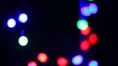 Renkli noel ışıkları bokeh etkisi. Tasarımınız için sanatsal, soyut odaklanmış arkaplan