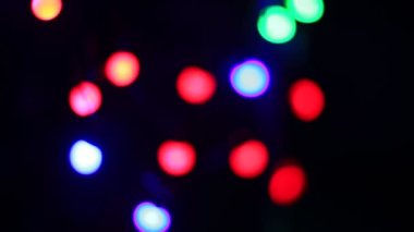 Renkli noel ışıkları bokeh etkisi. Tasarımınız için sanatsal, soyut odaklanmış arkaplan