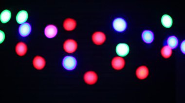 Renkli noel ışıkları bokeh etkisi. Tasarımınız için sanatsal, soyut odaklanmış arkaplan