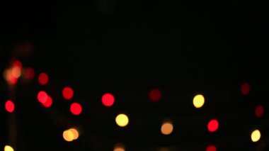 Renkli noel ışıkları bokeh etkisi. Tasarımınız için sanatsal, soyut odaklanmış arkaplan.