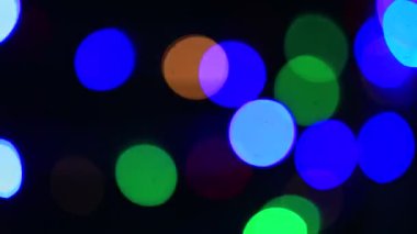 Renkli noel ışıkları bokeh etkisi. Tasarımınız için sanatsal, soyut odaklanmış arkaplan.
