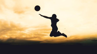 Bir voleybol oyuncusunun silueti dağda pratik yapıyor ve akşam çok güzel bir manzara sunuyor.
