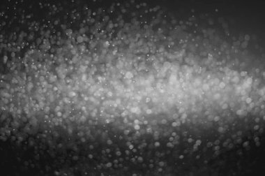 Projenizin arka planı için bulanık bir lensten Bokeh 'in siyah-beyaz görüntüsü.