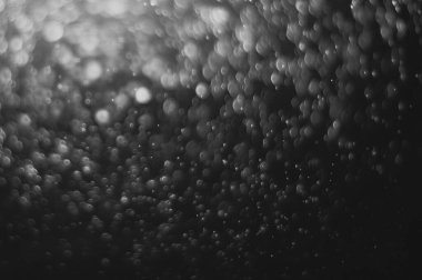 Projenizin arka planı için bulanık bir lensten Bokeh 'in siyah-beyaz görüntüsü.