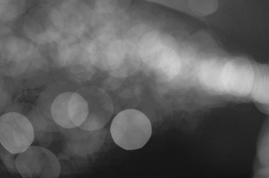 Projenizin arka planı için bulanık bir lensten Bokeh 'in siyah-beyaz görüntüsü.