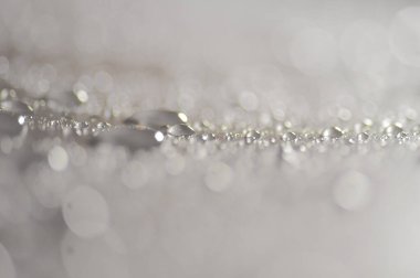 Su damlacıkları ve bulanık lensler tarafından oluşturulan Bokeh 'in soyut arkaplanı.