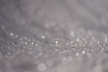 Su damlacıkları ve bulanık lensler tarafından oluşturulan Bokeh 'in soyut arkaplanı.