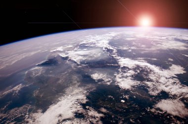 Uzaydan dünya görüşü çok güzel güneş ışığına sahiptir. Dünya ve uzay kavramı. Resmin ögesi NASA tarafından dekore edilmiştir.