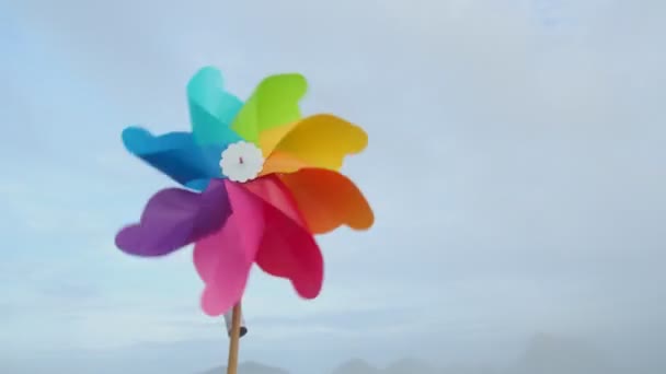 Colorful Windmills Spinning Mountain Copy Space — Stock Video