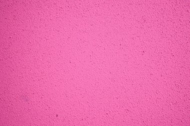Parlak pembe desenli bir duvarın yakın çekimi, arka plan, tasarım ve yaratıcı projeler için ideal.
