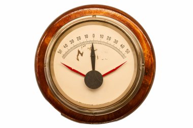 A vintage barometer features a round wooden frame and a white dial. The needle indicates atmospheric pressure, showcasing classic craftsmanship and design.