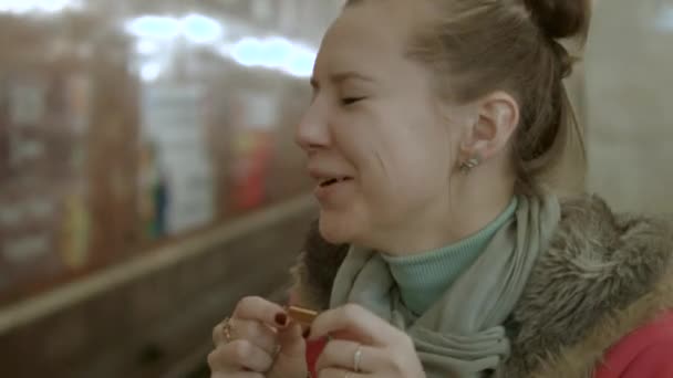 Girl playing the harmonica — Stock Video