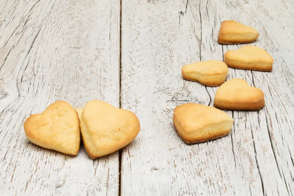 Cookies in the shape of a heart  on  wooden background — Stock Photo, Image