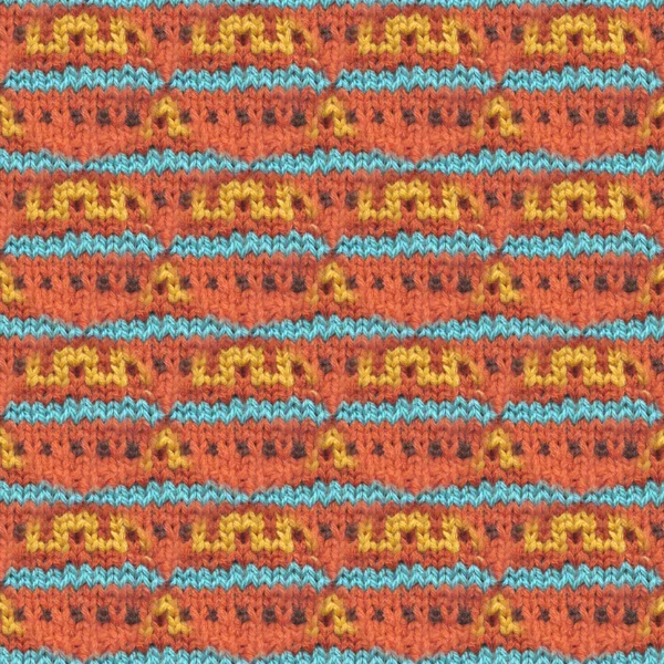 Knitted woolen seamless pattern. Beautiful red, blue, yellow knit texture for textile. Repeating abstract background — Stock Photo, Image
