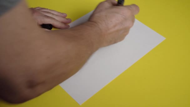 Man Traces Exclamation Mark Marker White Sheet Paper — Stock Video