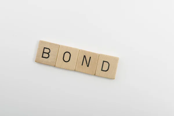 Слово bond — стоковое фото