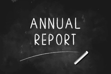Tahta simge logo tasarımı illüstrasyonu üzerine tebeşirle yazılmış ANNUAL REPORT
