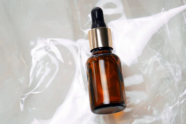 Top View Selective Focus Mock Cosmetic Product Transparent Shiny Plastic — Stock Photo, Image