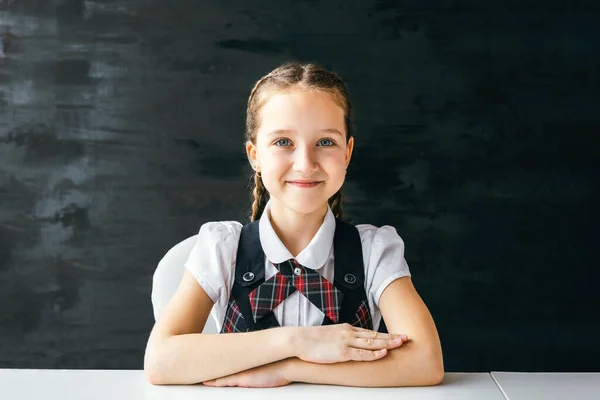 Portrait Beautiful Positive Little Schoolgirl Sitting Her Desk Back School — Stock Photo, Image