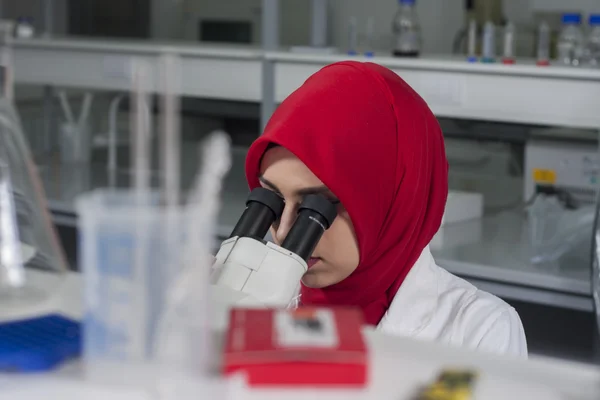 Group of young medical workers are working in lab as lab technic