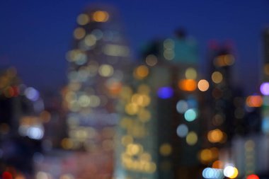 Soyut Bokeh şehir manzarası gece lambası, Şehir manzarası Bokeh, Bulanık Fotoğraf, Şehir Işığı Bokeh arka planı, Alacakaranlık Zamanında Bulanık Şehir.