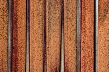 Paslanmış grunge metal dokusu. Metal aşınması. Kaynakta pas ve aşınma var. Eski demir, pas ve oksitlenmiş metal zemin üzerinde paslandırıcı pas. Eski metal panel.