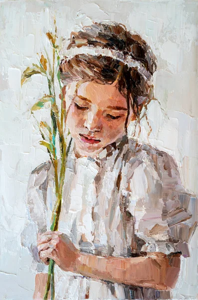 Ragazza con un fiore in mano su uno sfondo bianco. — Foto Stock