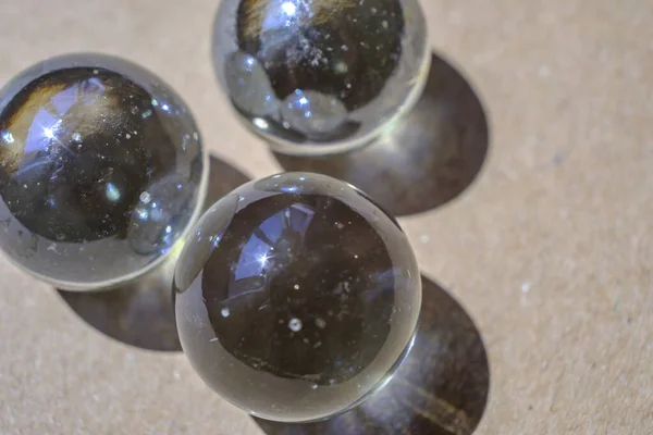 Three Shiny Glass Balls Recycled Paper — Foto Stock