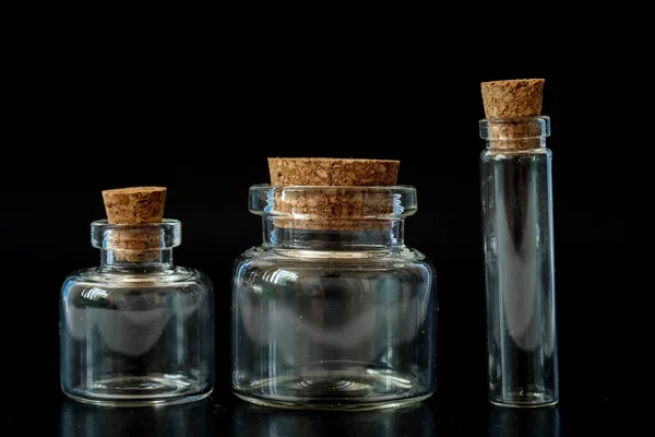 Small Glass Jars Cork Black Background — Foto Stock