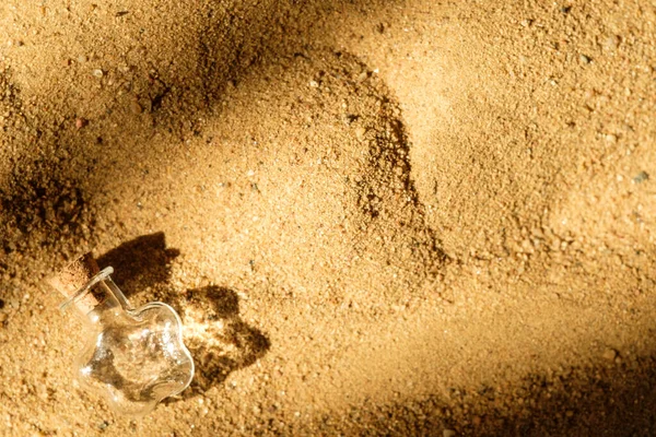Small Glass Jar Cork Lying Sand — Stock Photo, Image