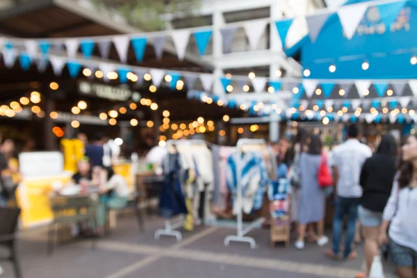 Blurry crowded market