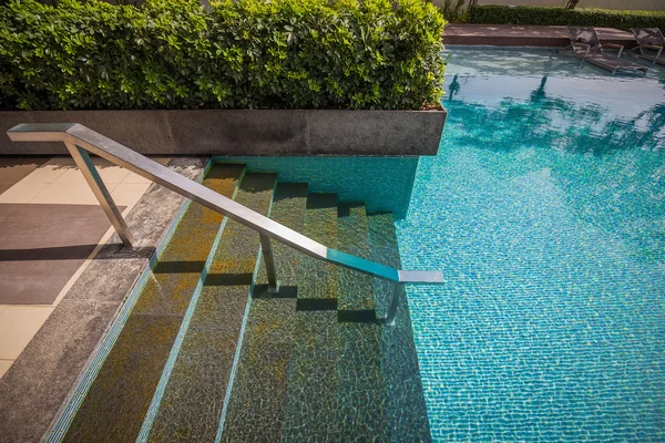 Down stair with bar into swimming pool — Stock Photo, Image